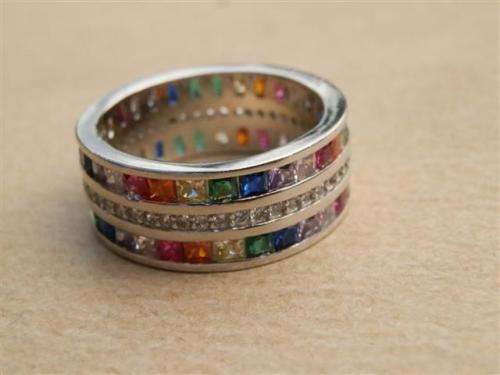 Marvelous solid sterling silver ruby, sapphire, amethyst, emerald and topaz ring - weight 6.77 g.