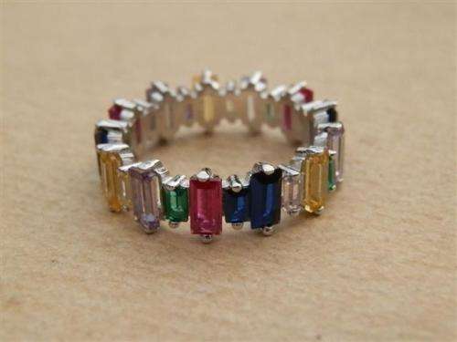 Alluring solid sterling silver ruby, blue sapphire and topaz ring - weight 3.15 g.