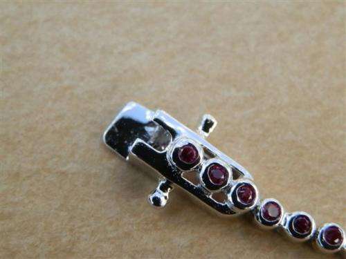 Charming solid sterling silver ruby and blue sapphire bracelet - weight 5.45 g.