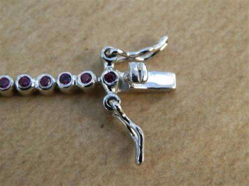 Charming solid sterling silver ruby and blue sapphire bracelet - weight 5.45 g.