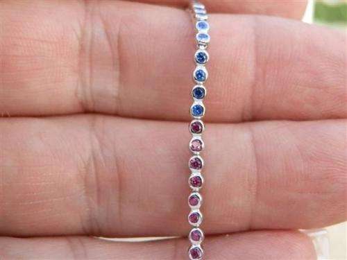 Charming solid sterling silver ruby and blue sapphire bracelet - weight 5.45 g.