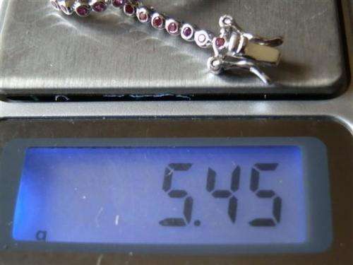 Charming solid sterling silver ruby and blue sapphire bracelet - weight 5.45 g.