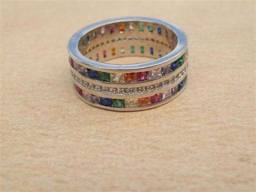 Marvelous solid sterling silver ruby, sapphire, amethyst, emerald and topaz ring - weight 6.77 g.