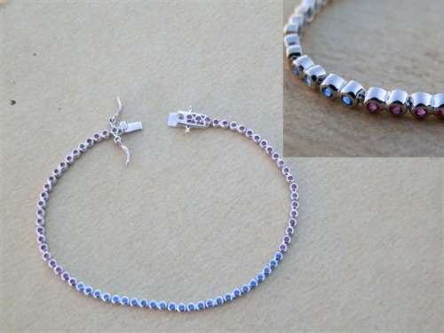 Charming solid sterling silver ruby and blue sapphire bracelet - weight 5.45 g.