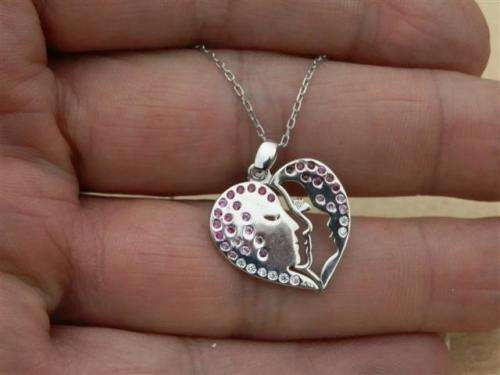 Fabulous solid sterling silver ruby en topaz necklace - weight 2.39 g.