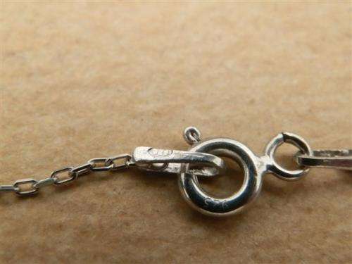 Fabulous solid sterling silver ruby en topaz necklace - weight 2.39 g.