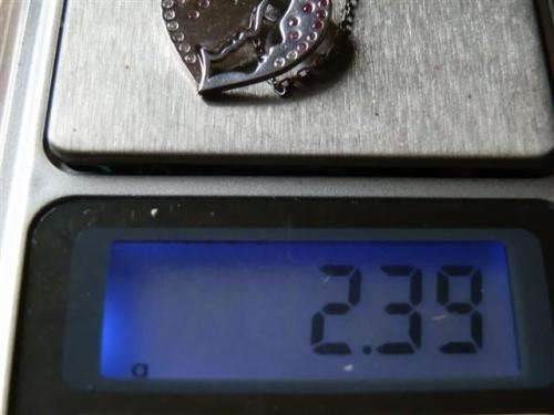 Fabulous solid sterling silver ruby en topaz necklace - weight 2.39 g.