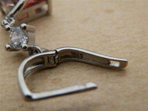 Marvelous solid sterling silver color changing Zultanite and topaz earrings - weight 7.28 g.