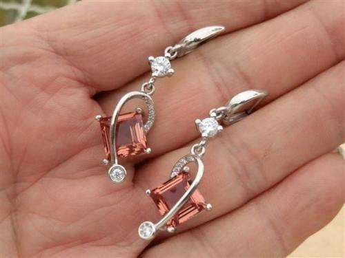 Marvelous solid sterling silver color changing Zultanite and topaz earrings - weight 7.28 g.