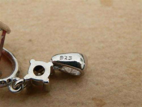 Lovely solid sterling silver color changing Zultanite and topaz pendant - weight 3.37 g.