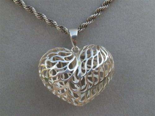 Awesome heavy solid sterling silver rope chain and a large filigree heart pendant - weight 21.94 g.