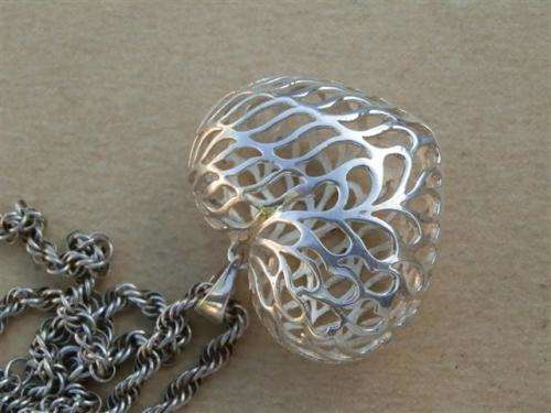 Awesome heavy solid sterling silver rope chain and a large filigree heart pendant - weight 21.94 g.