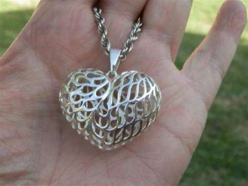Awesome heavy solid sterling silver rope chain and a large filigree heart pendant - weight 21.94 g.