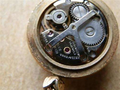 Antique lady's Albert fob chain with pocket watch and fob seal.