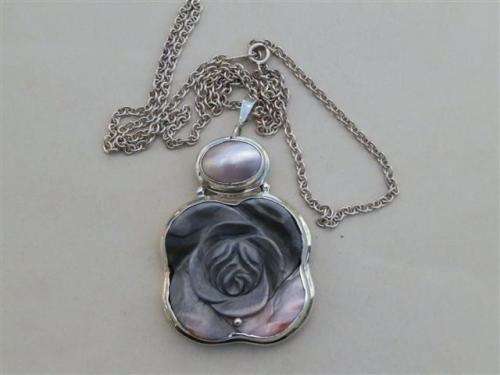 Smashing solid sterling silver mother of pearl pendant and chain - weight 48.7 g.