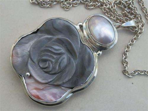 Smashing solid sterling silver mother of pearl pendant and chain - weight 48.7 g.
