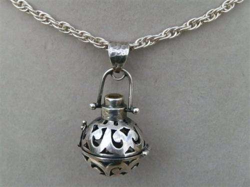 Exquisite solid sterling silver citrine ball pendant on a rope chain - weight 22.9 g.