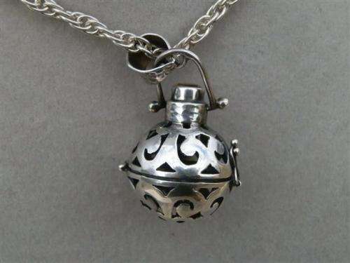 Exquisite solid sterling silver citrine ball pendant on a rope chain - weight 22.9 g.