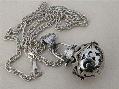 Exquisite solid sterling silver citrine ball pendant on a rope chain - weight 22.9 g.