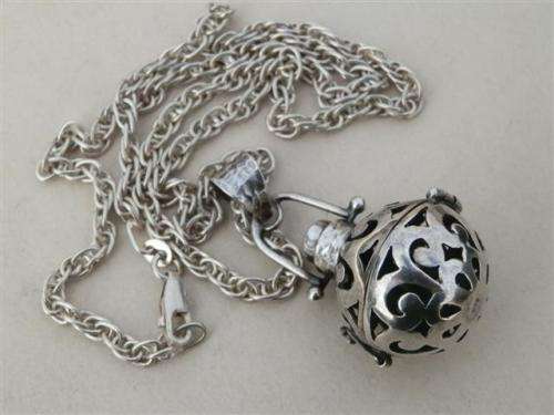 Exquisite solid sterling silver citrine ball pendant on a rope chain - weight 22.9 g.