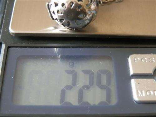 Exquisite solid sterling silver citrine ball pendant on a rope chain - weight 22.9 g.