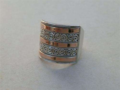Stunning solid 18 ct rose gold and sterling silver fancy ring - weight 7.7 g.
