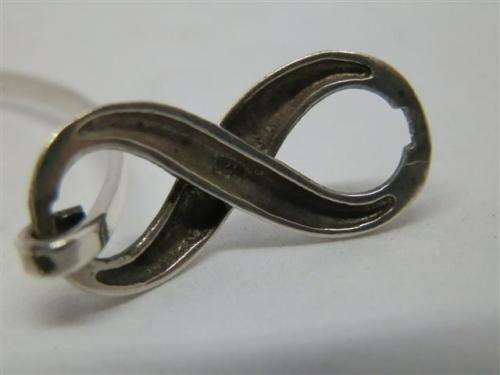 Marvelous solid sterling silver infinity bracelet