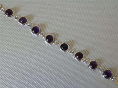 Astonishing solid sterling silver amethyst bracelet - weight 13.23 g.