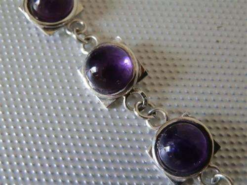 Astonishing solid sterling silver amethyst bracelet - weight 13.23 g.