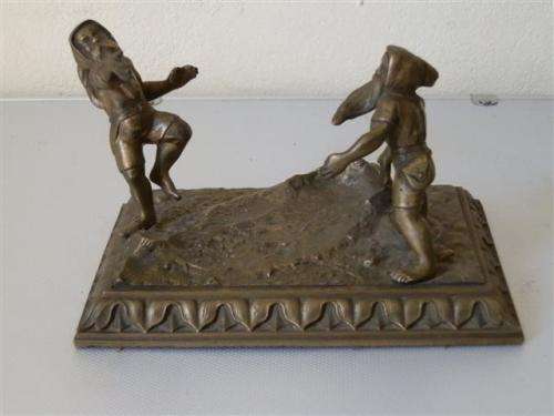 Antique brass gnomes paper weight