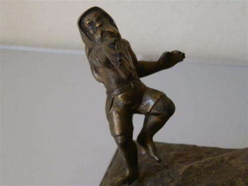 Antique brass gnomes paper weight