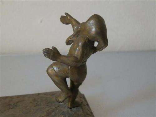 Antique brass gnomes paper weight