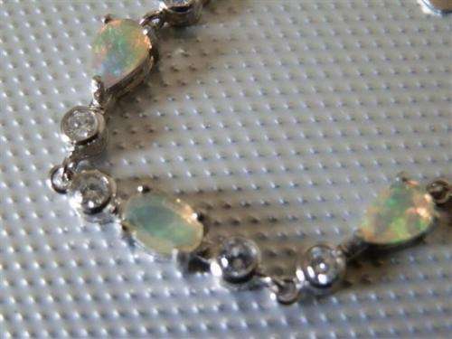 Elegant solid sterling silver white gold natural Fire Opal bracelet - weight 3.85 g.