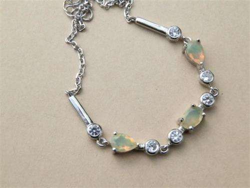 Elegant solid sterling silver white gold natural Fire Opal bracelet - weight 3.85 g.