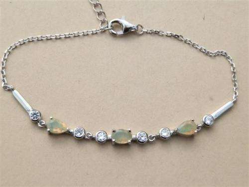 Elegant solid sterling silver white gold natural Fire Opal bracelet - weight 3.85 g.