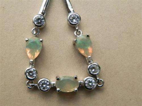 Elegant solid sterling silver white gold natural Fire Opal bracelet - weight 3.85 g.