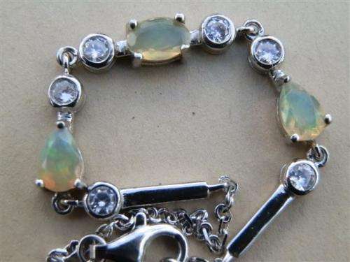 Elegant solid sterling silver white gold natural Fire Opal bracelet - weight 3.85 g.