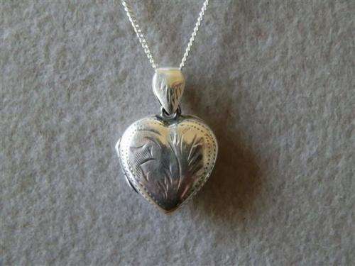 Charming solid sterling silver heart necklace