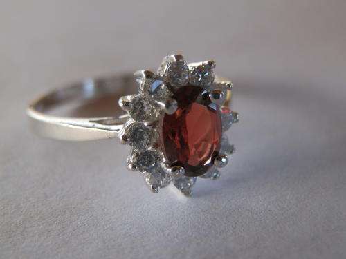Sterling silver garnet and topaz ring - shipping R40 insured