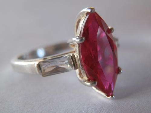 Sterling silver ruby and topaz ring - shipping R40 insured