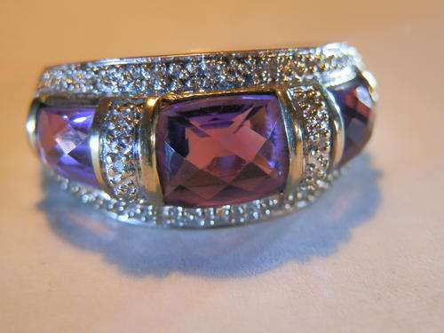 9 ct Gold - 3.8 gram - diamond and amethyst ring - thirty (30) days to pay.  Value R8,580