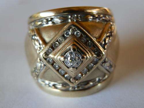 Heavy - 10,6 gram - 9 ct gold diamond ring - thirty (30) days to pay.  Value R18,640