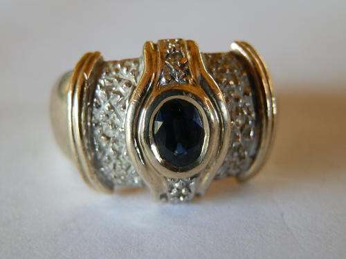 Heavy - 5.7 gram - solid 9 ct gold blue sapphire ring - thirty (30) days to pay.  Value R7,860