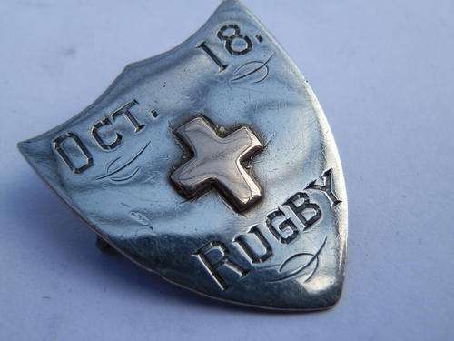 PRICE REDUCED!  Antique sterling silver and 9 ct gold rugby badge - thirty (30) days to pay
