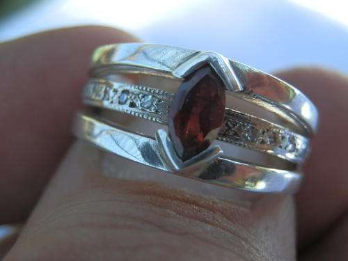New sterling silver 14 diamonds and garnet ring, value R3,780 - thirty (30) days to pay