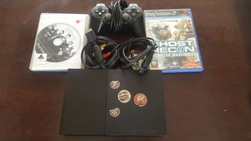 PS2 (Slim-Line) + 1 Controller + Cables + 2 Games