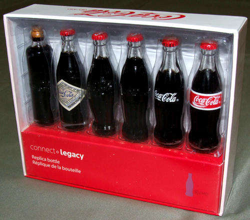 EVOLUTION OF THE COCA COLA BOTTLE - 6 MINIATURE COKE BOTTLES