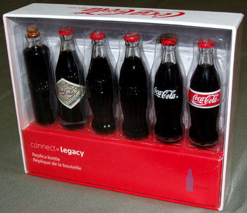 EVOLUTION OF THE COCA COLA BOTTLE - 6 MINIATURE COKE BOTTLES