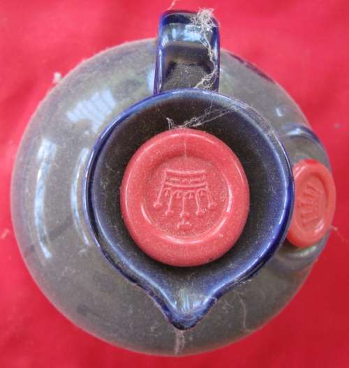 BALLANTINES WHISKEY IN PORCELAIN BOTTLE