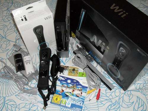 Nintendo Wii, 2 Controllers, Rechargable Battery Packs, Still under warranty..